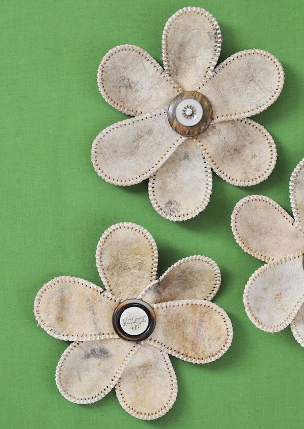 DIY leather flowers made from old baseball skins.