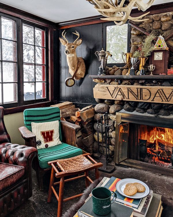 Stone fireplace in old cabin.