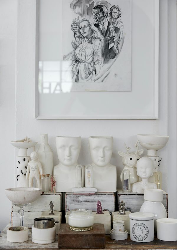 Collectibles gathered in multiple shades of white and cream.
