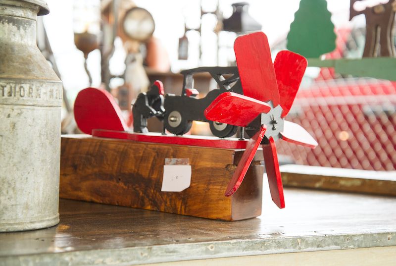 Vintage items on a table at a flea market.