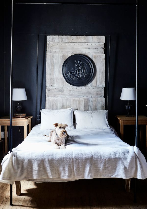 Bedroom in black and white with vintage furniture and accessories.