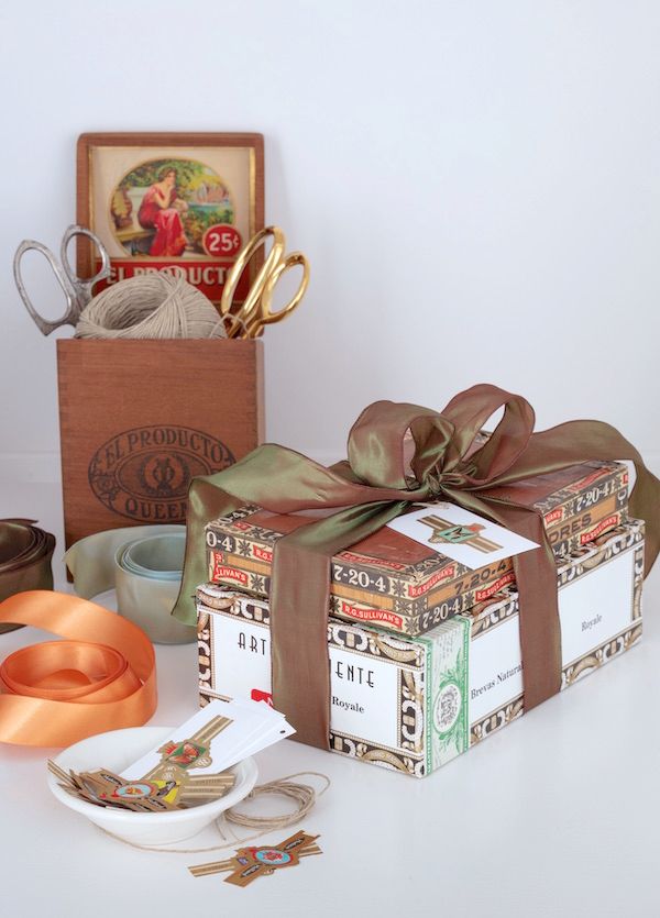 Vintage cigar boxes used to wrap gifts.